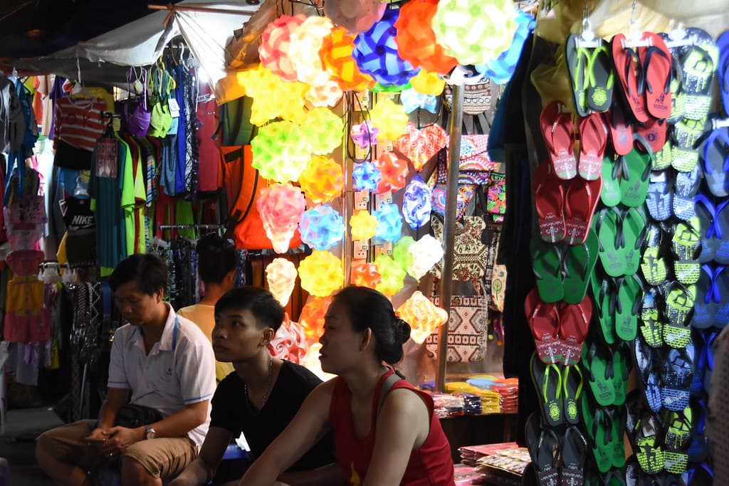 Colourful display of rubber sandals and lamps near the Ben Thanh Market, Saigon