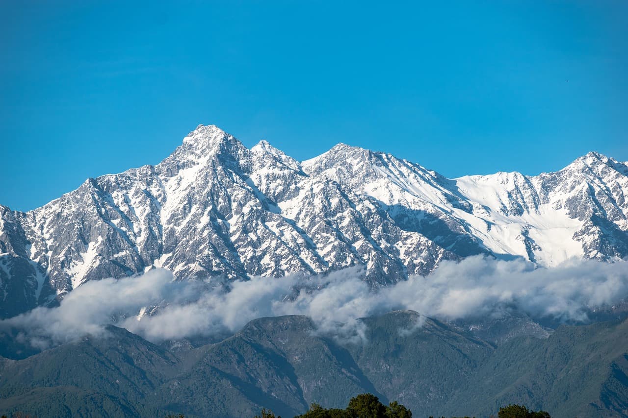 View from Pu Si Lung summit, showing rugged border ridges and wild scenery.